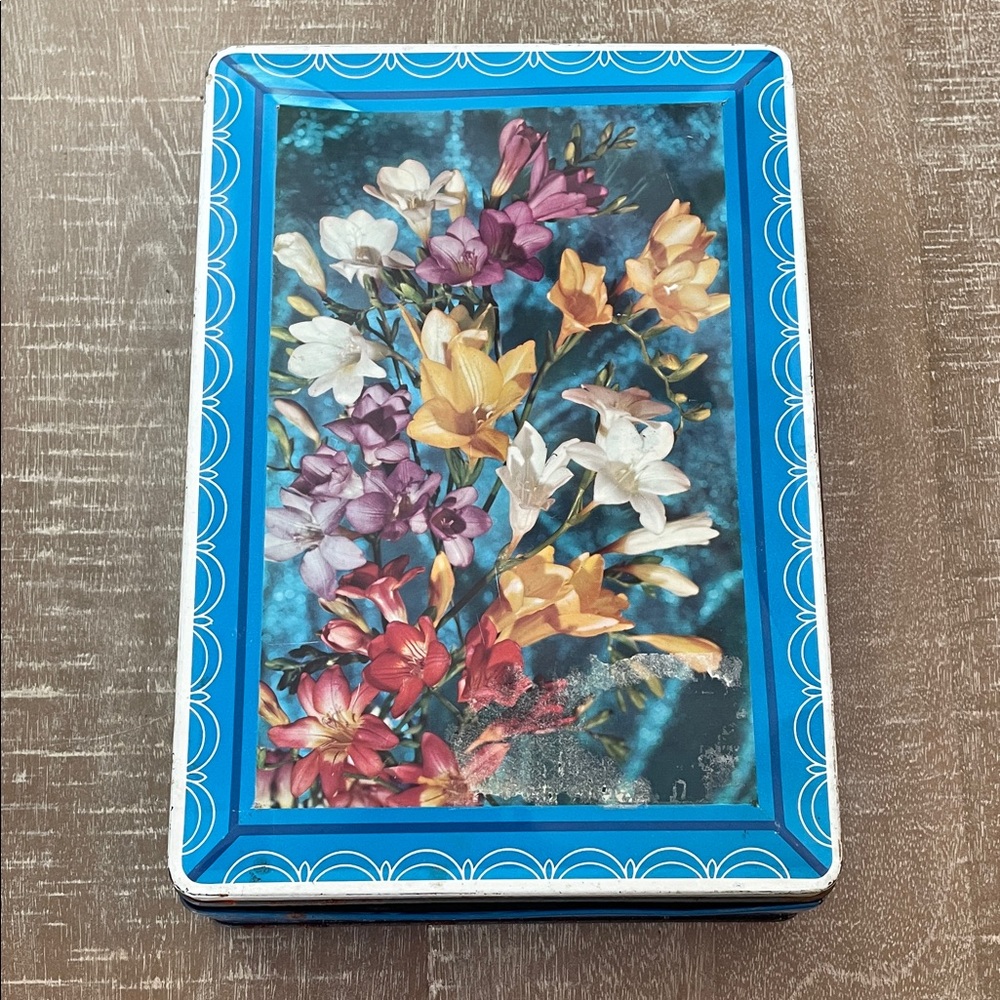 Vintage Blue Decorative Storage Tin with Floral Print, Fair Condition